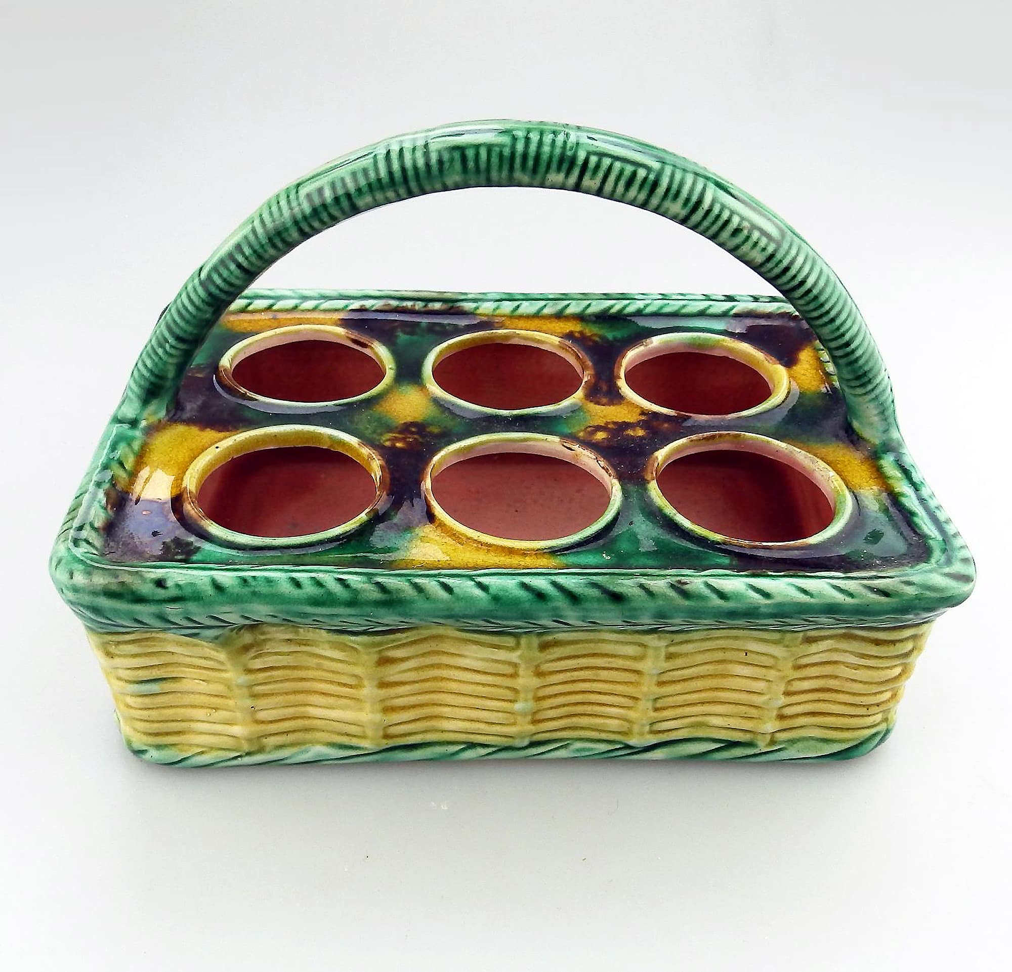 An antique novelty tortoiseshell glaze Majolica pottery Basket Egg Stand C.19thC