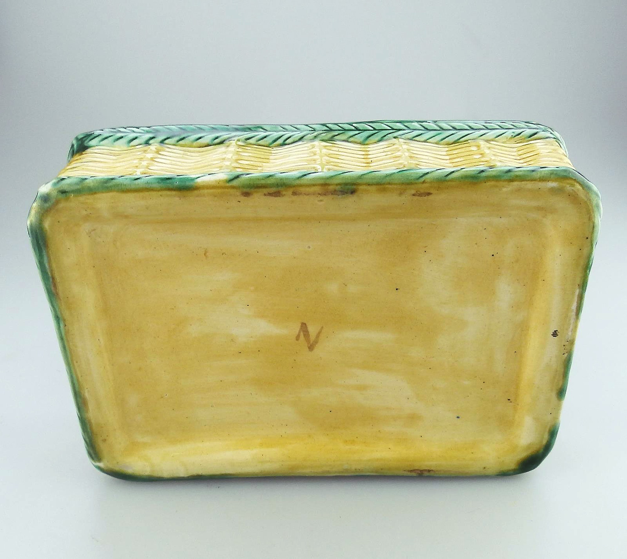 An antique novelty tortoiseshell glaze Majolica pottery Basket Egg Stand C.19thC