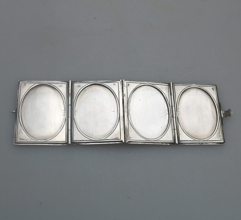 An antique 935 solid silver novelty quadrifold Pocket Photograph Frame C.1910