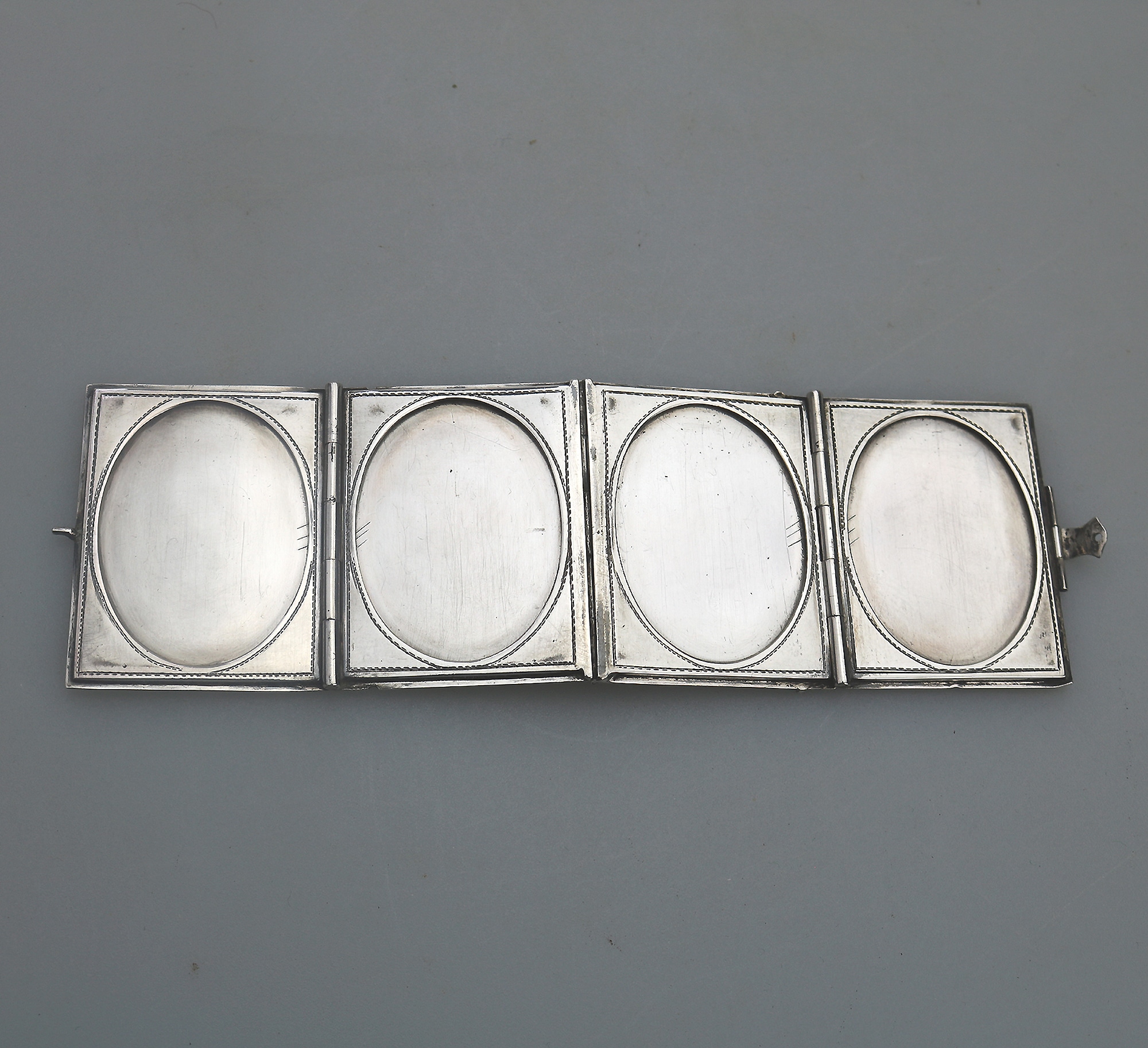 An antique 935 solid silver novelty quadrifold Pocket Photograph Frame C.1910