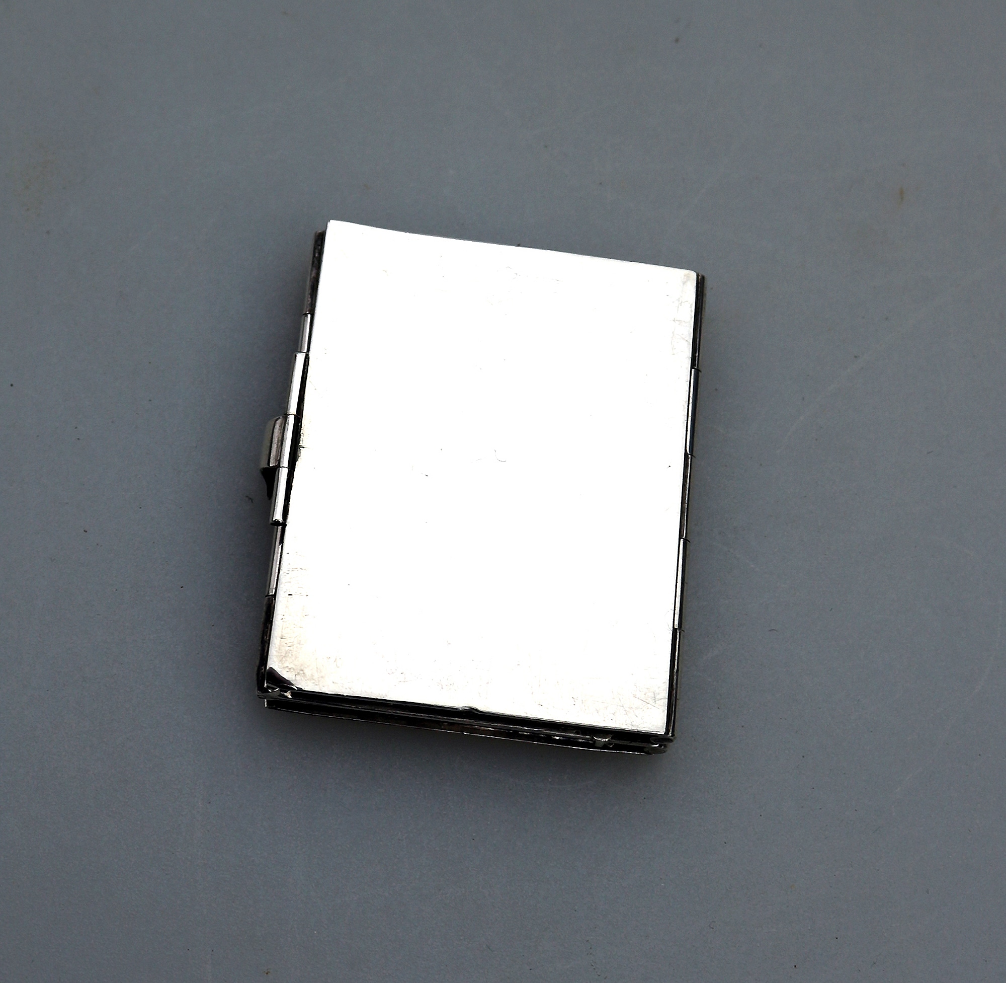 An antique 935 solid silver novelty quadrifold Pocket Photograph Frame C.1910