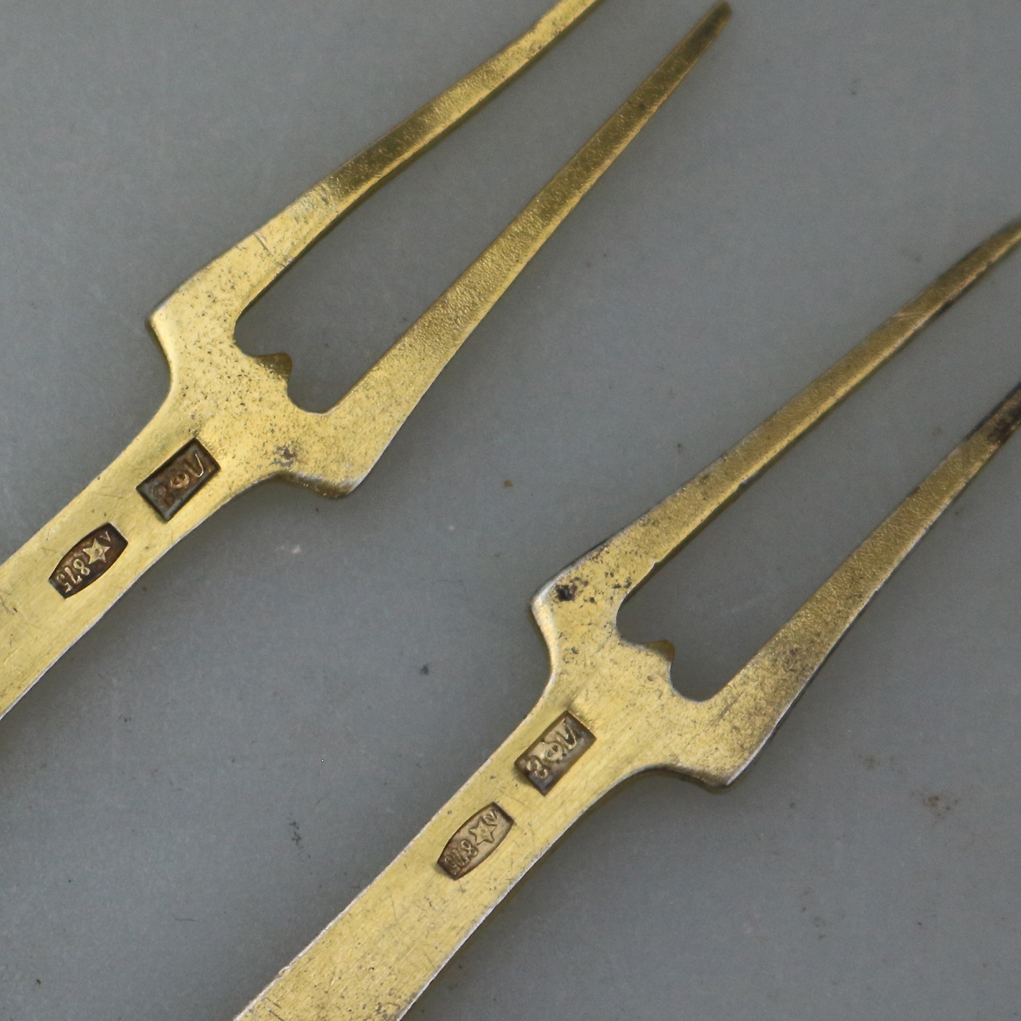 A good pair of Russian 875 solid silver gilt & enamel serving Lemon Forks C.1940+
