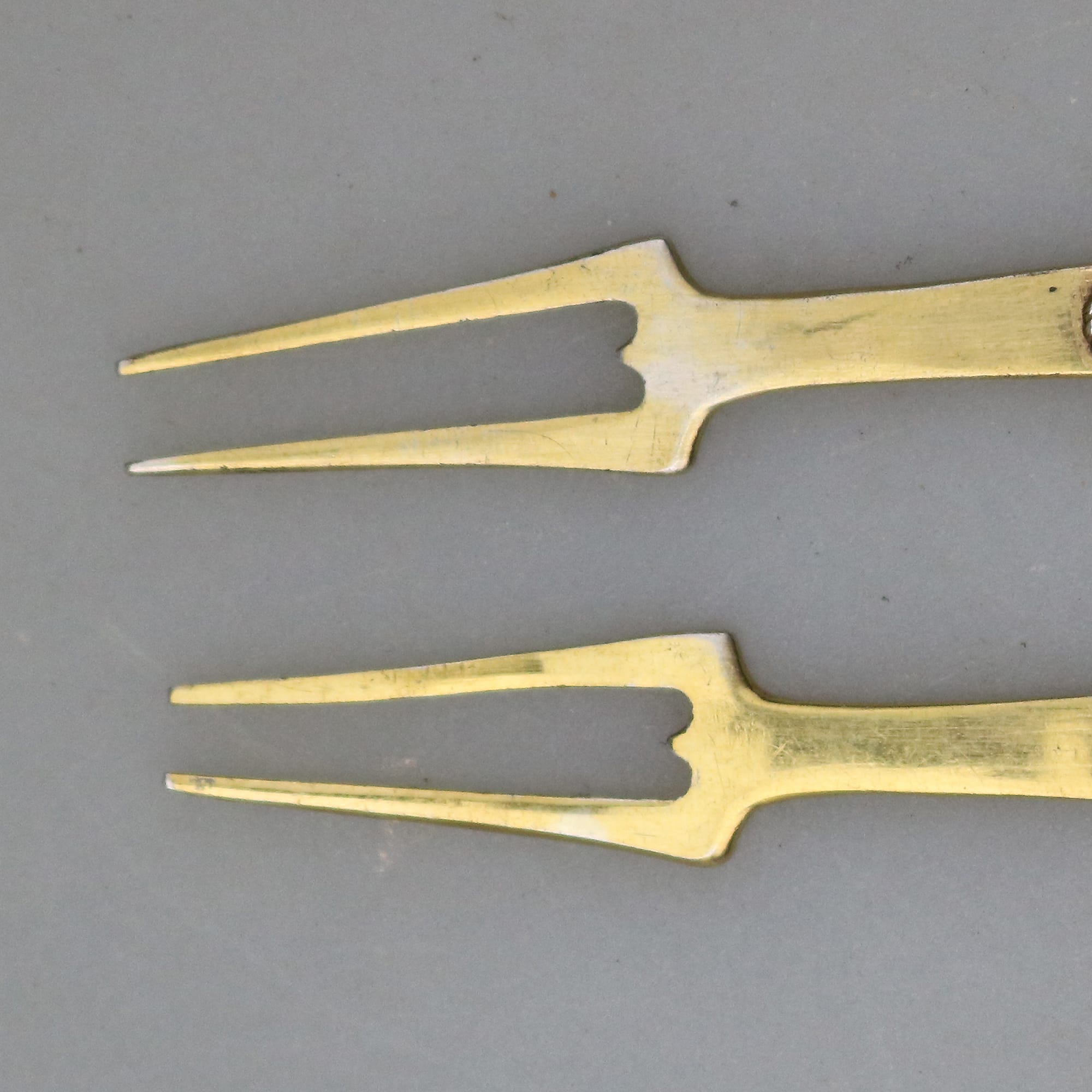 A good pair of Russian 875 solid silver gilt & enamel serving Lemon Forks C.1940+