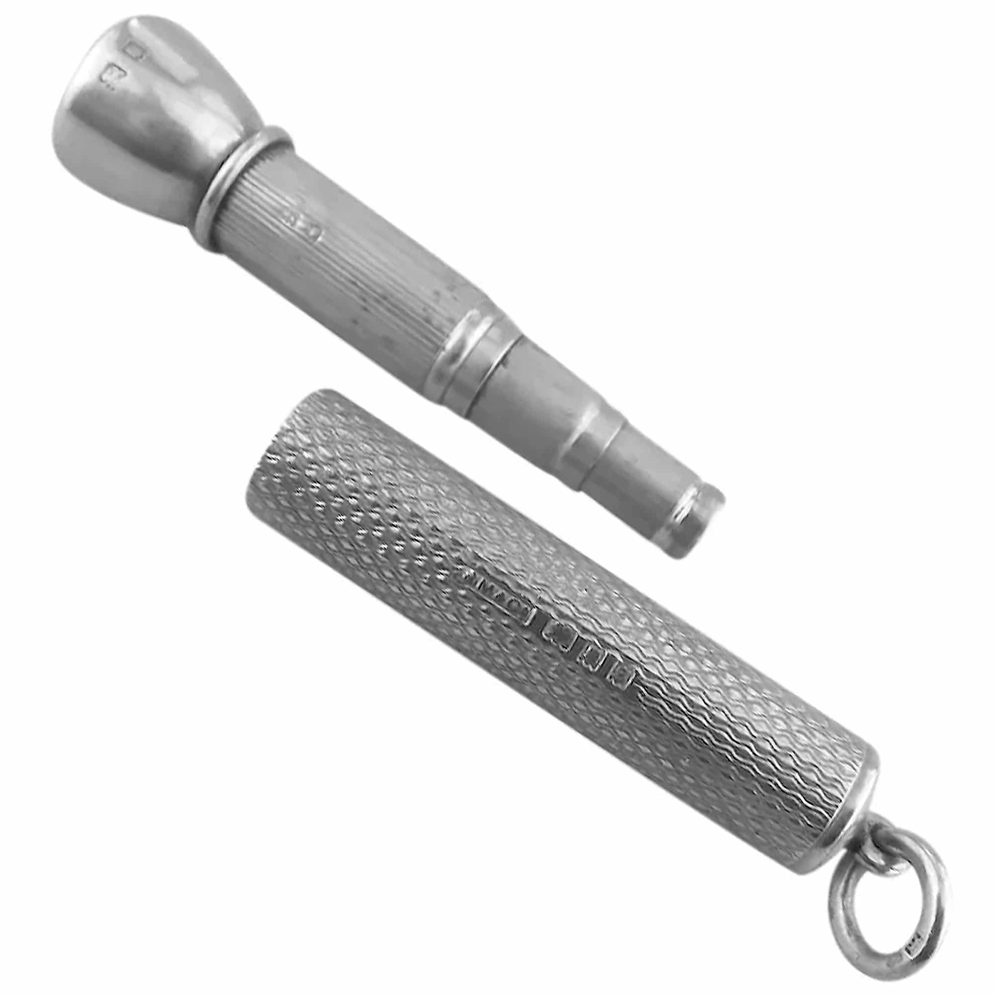 An antique English solid silver Sampson Mordan & Goldsmiths Cigar Piercer C.1933