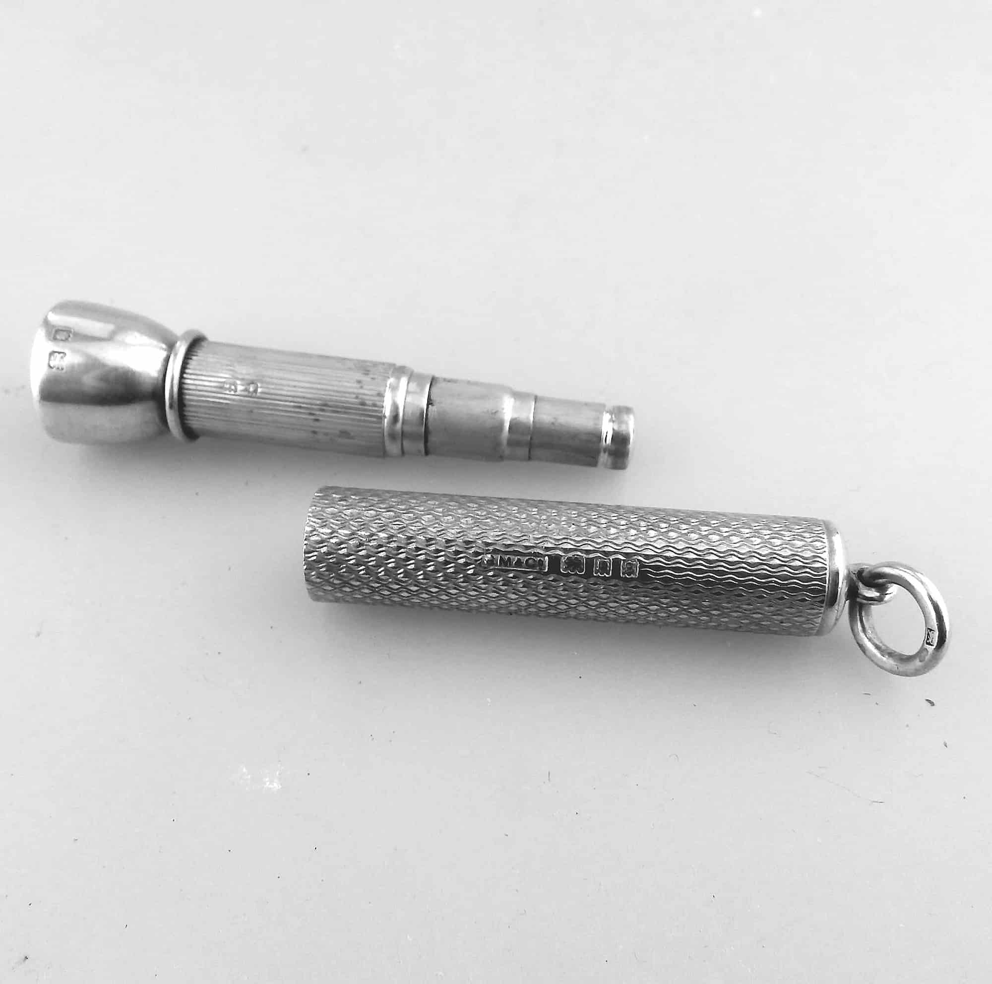 An antique English solid silver Sampson Mordan & Goldsmiths Cigar Piercer C.1933