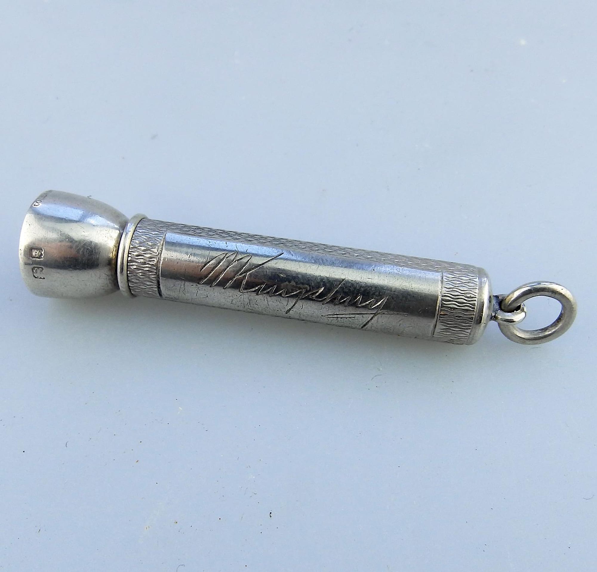 An antique English solid silver Sampson Mordan & Goldsmiths Cigar Piercer C.1933