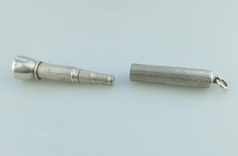 An antique English solid silver Sampson Mordan & Goldsmiths Cigar Piercer C.1933