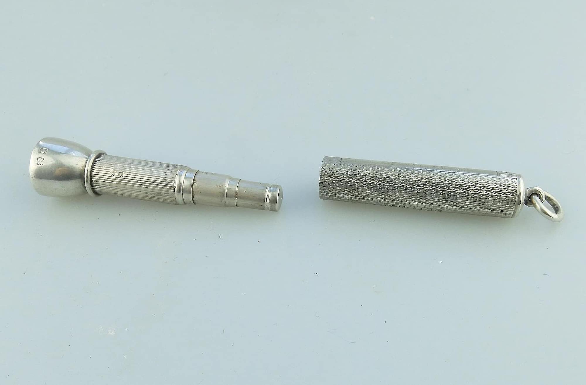 An antique English solid silver Sampson Mordan & Goldsmiths Cigar Piercer C.1933