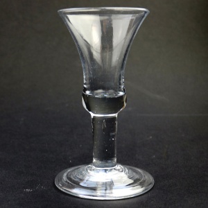 An antique Georgian folded foot & plain short tear drop stem Wine Glass C.18thC