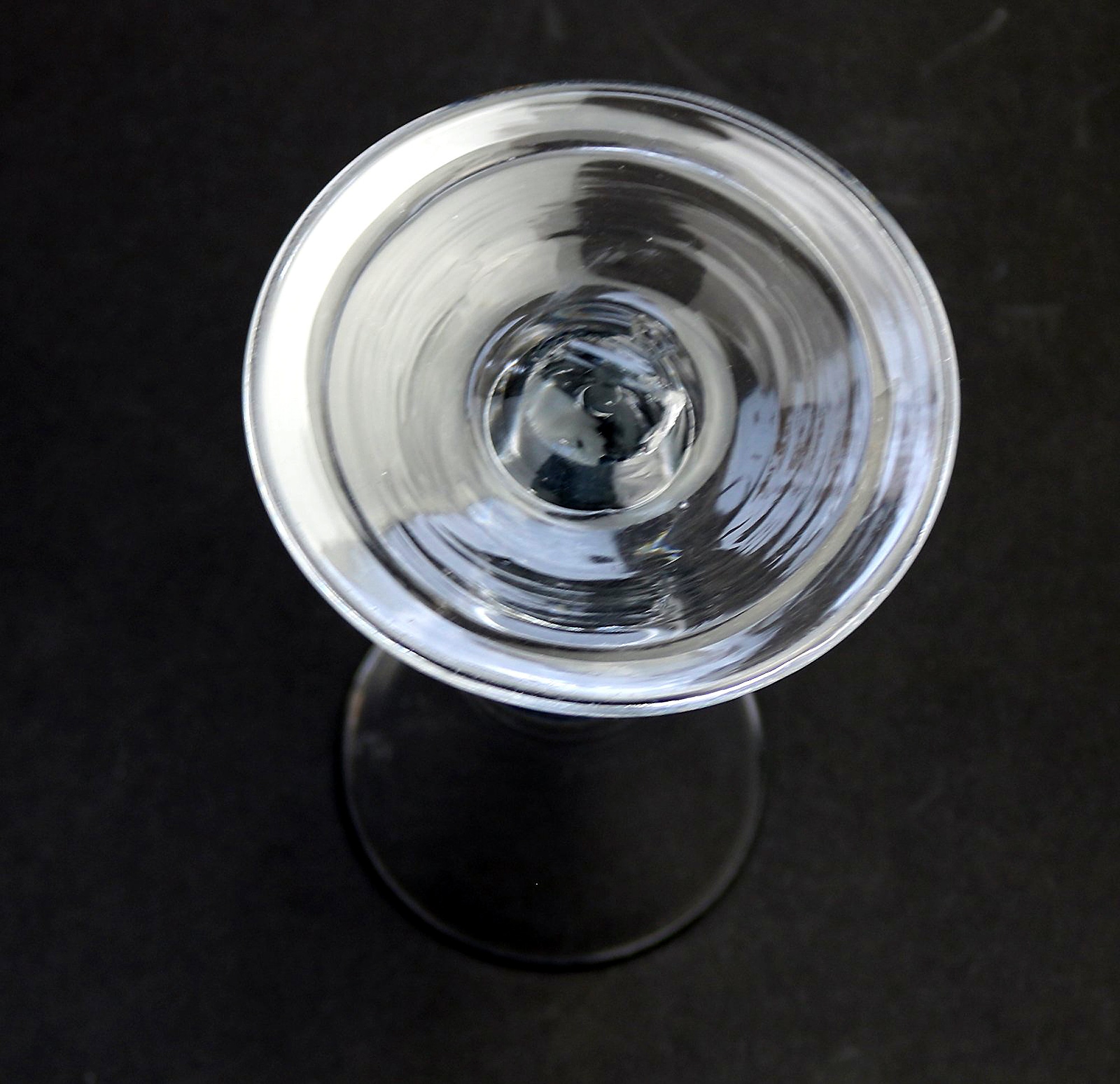 An antique Georgian folded foot & plain short tear drop stem Wine Glass C.18thC