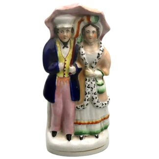 A very charming antique Staffordshire pottery Parasol Couple Figurine C.1850
