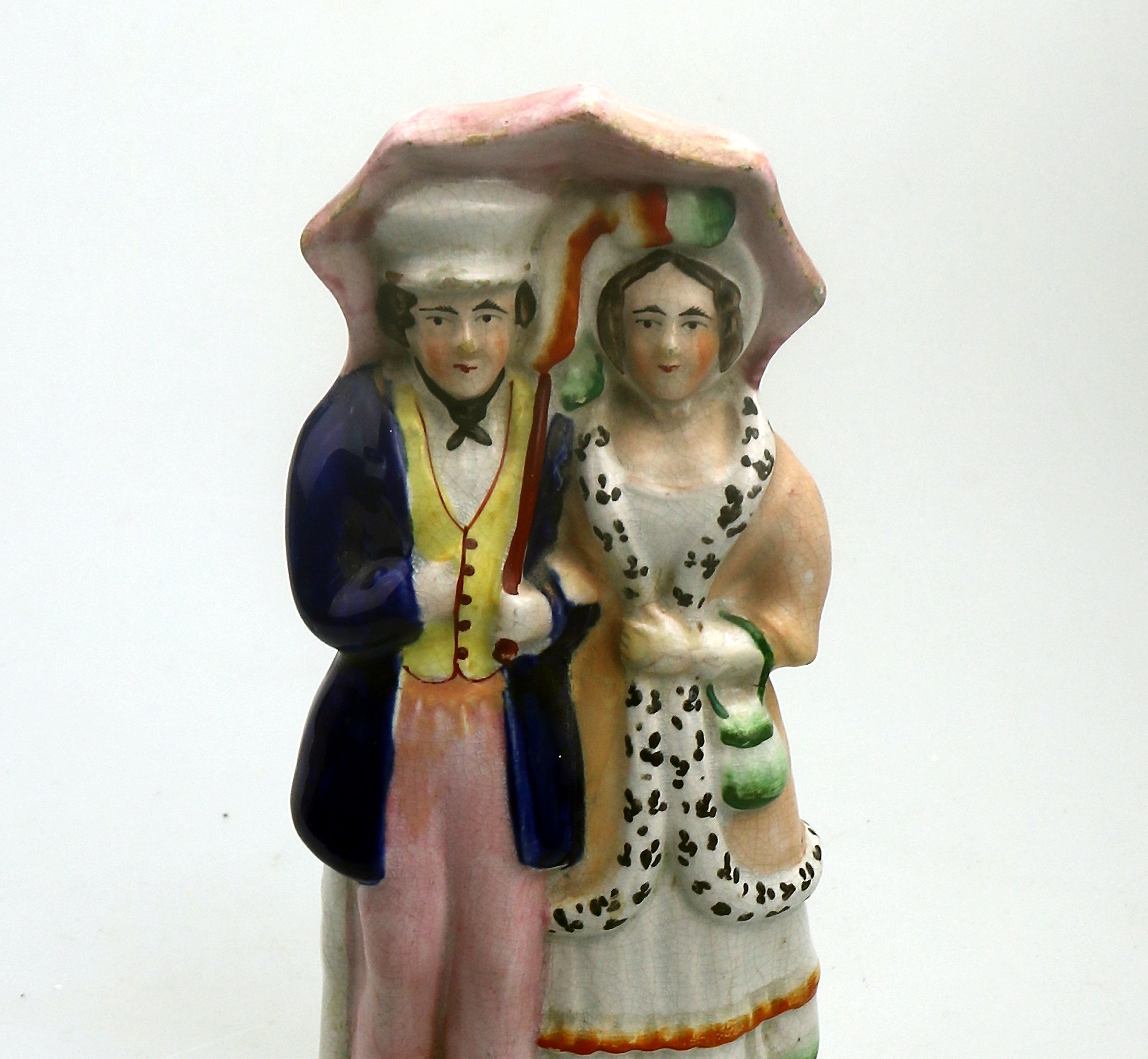 A very charming antique Staffordshire pottery Parasol Couple Figurine C.1850