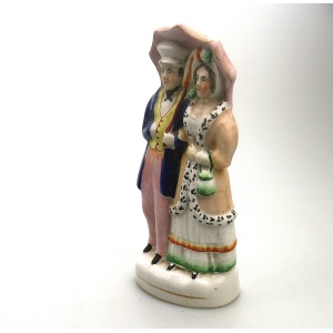 A very charming antique Staffordshire pottery Parasol Couple Figurine C.1850