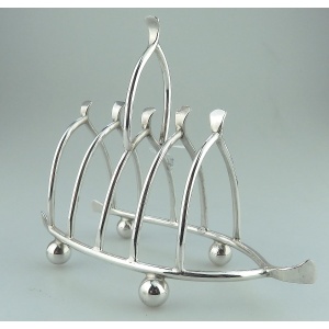 An antique novelty silver plated lucky Chicken Wishbone Toast Rack C.1920