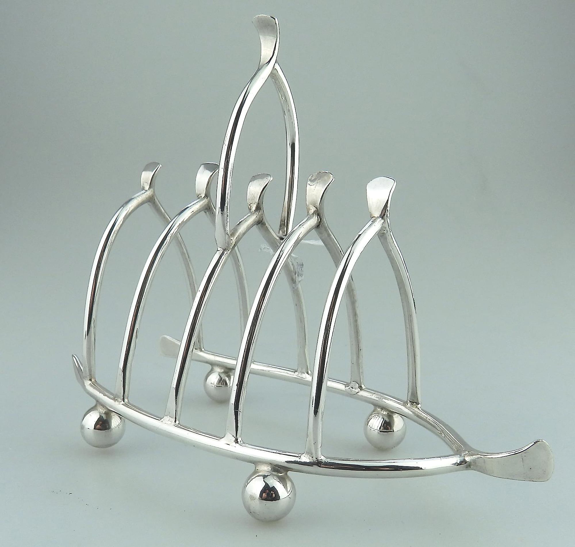 An antique novelty silver plated lucky Chicken Wishbone Toast Rack C.1920
