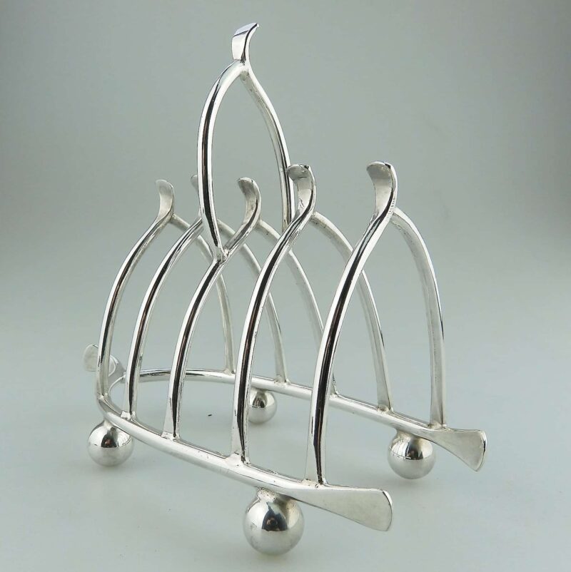 An antique novelty silver plated lucky Chicken Wishbone Toast Rack C.1920