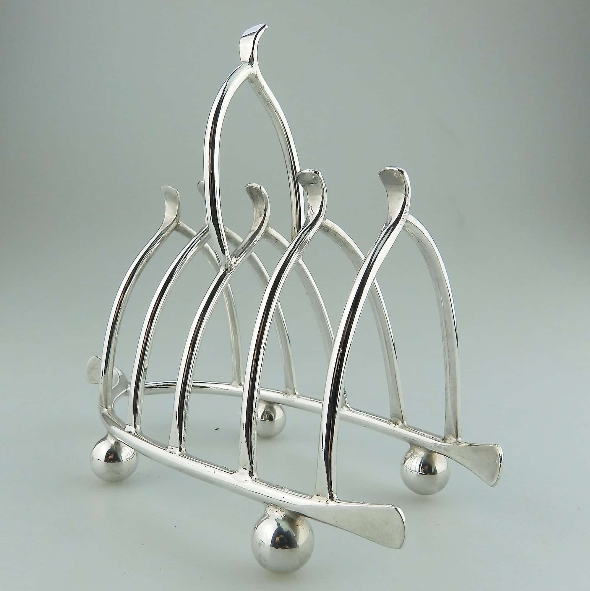 An antique novelty silver plated lucky Chicken Wishbone Toast Rack C.1920