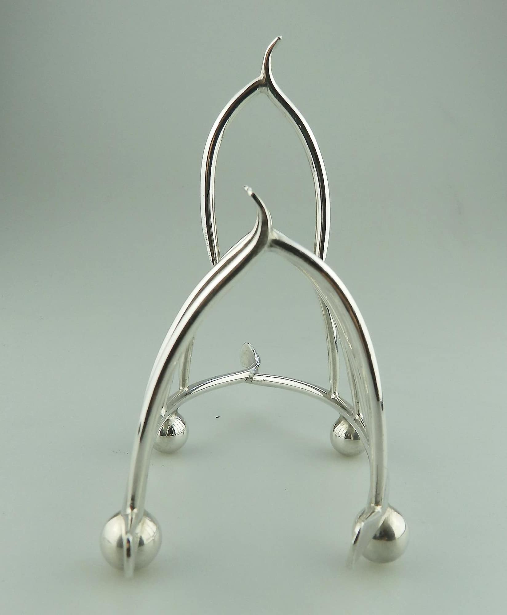 An antique novelty silver plated lucky Chicken Wishbone Toast Rack C.1920