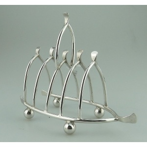 An antique novelty silver plated lucky Chicken Wishbone Toast Rack C.1920