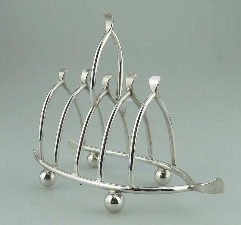 An antique novelty silver plated lucky Chicken Wishbone Toast Rack C.1920