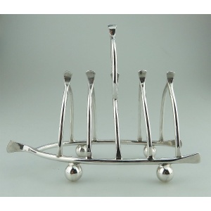 An antique novelty silver plated lucky Chicken Wishbone Toast Rack C.1920