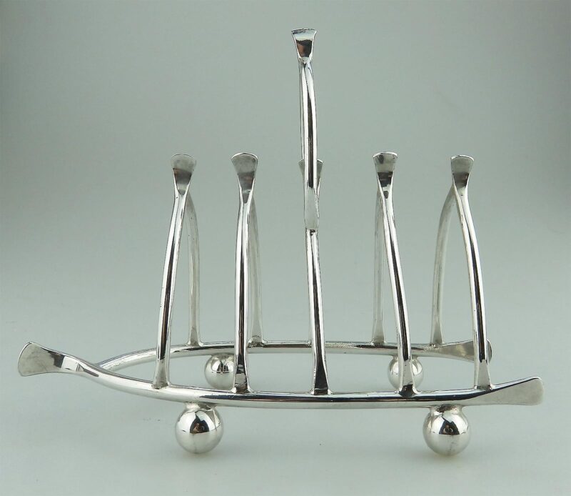 An antique novelty silver plated lucky Chicken Wishbone Toast Rack C.1920