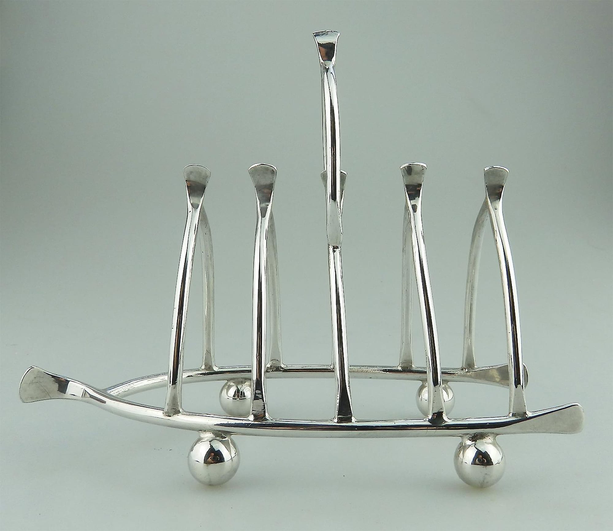 An antique novelty silver plated lucky Chicken Wishbone Toast Rack C.1920