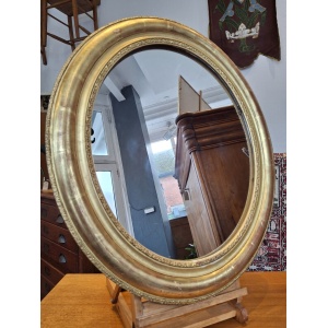 19th Century French Gilt Framed Oval Wall Mirror. Antique/Interiors.