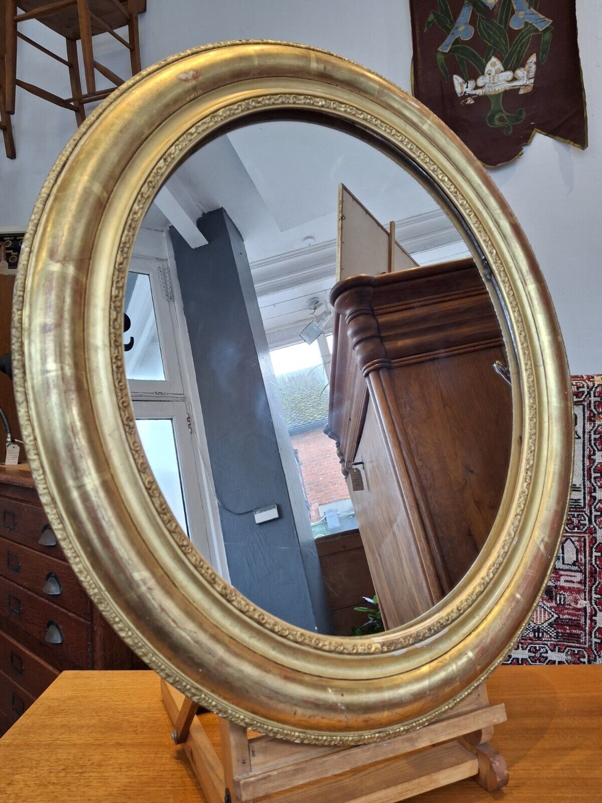 19th Century French Gilt Framed Oval Wall Mirror. Antique/Interiors.
