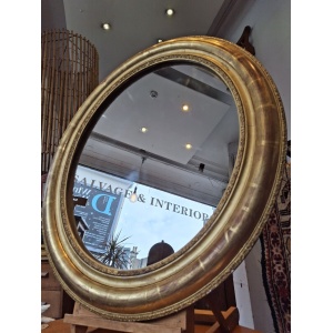 19th Century French Gilt Framed Oval Wall Mirror. Antique/Interiors.