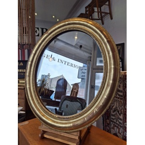 19th Century French Gilt Framed Oval Wall Mirror. Antique/Interiors.