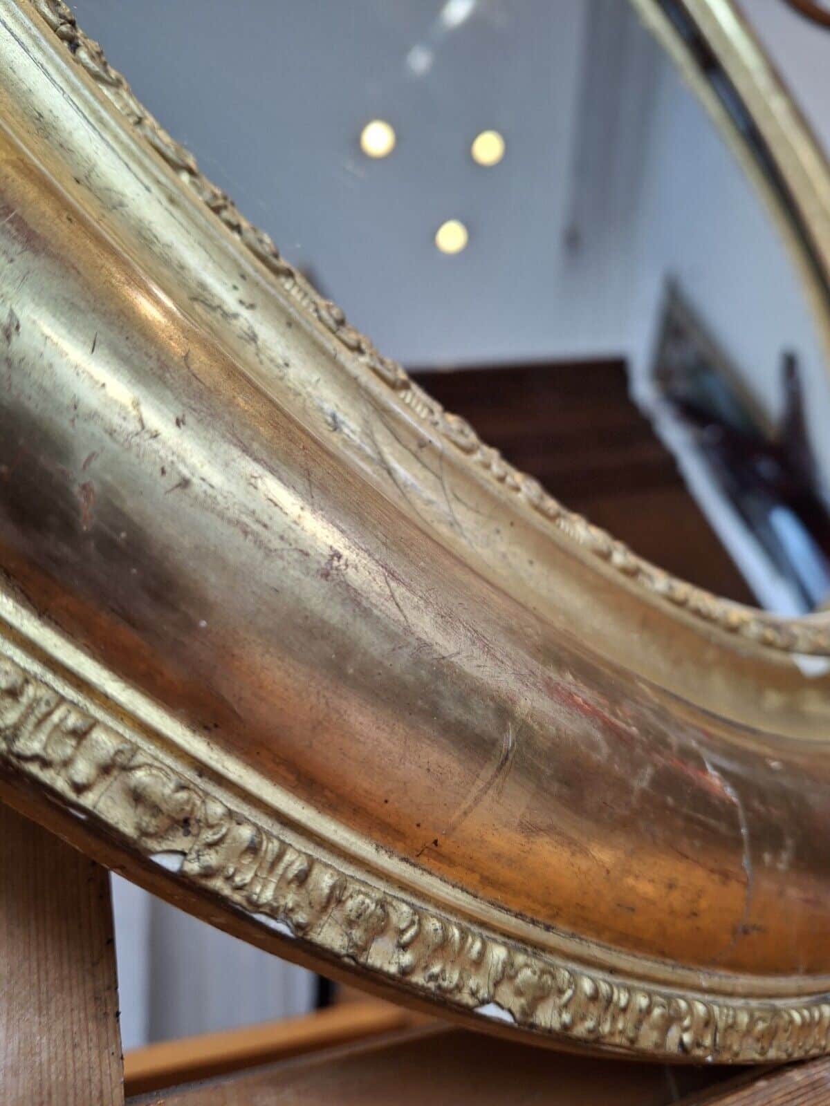 19th Century French Gilt Framed Oval Wall Mirror. Antique/Interiors.