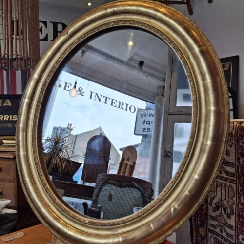 19th Century French Gilt Framed Oval Wall Mirror. Antique/Interiors.