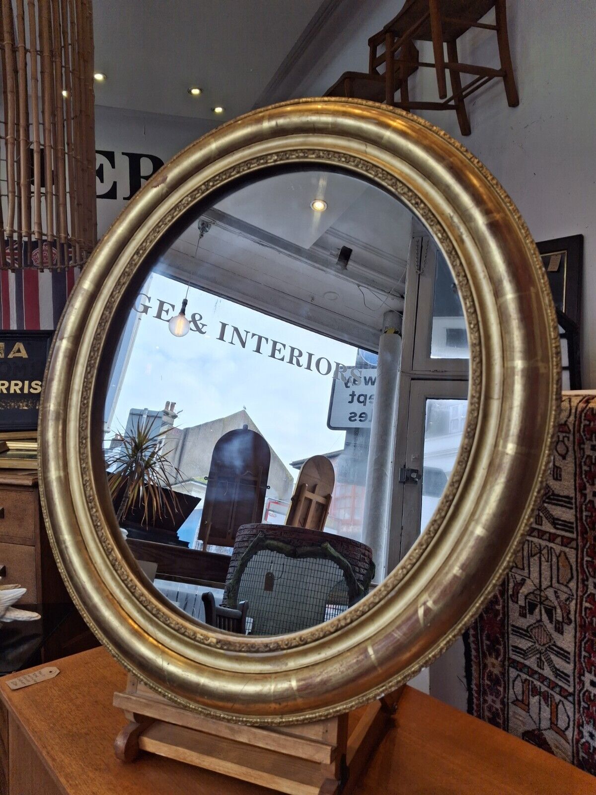 19th Century French Gilt Framed Oval Wall Mirror. Antique/Interiors.