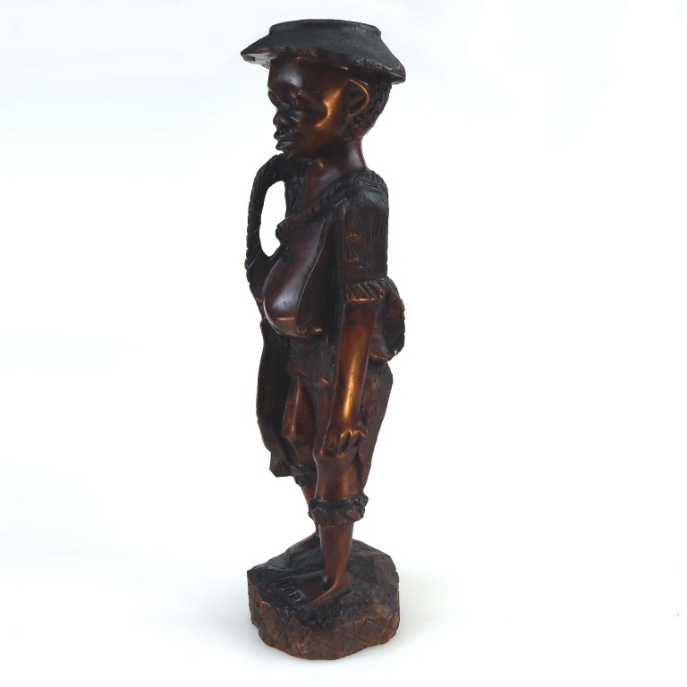 A large vintage hand-carved wood African Figure of a fisherman C.early/mid 20thC