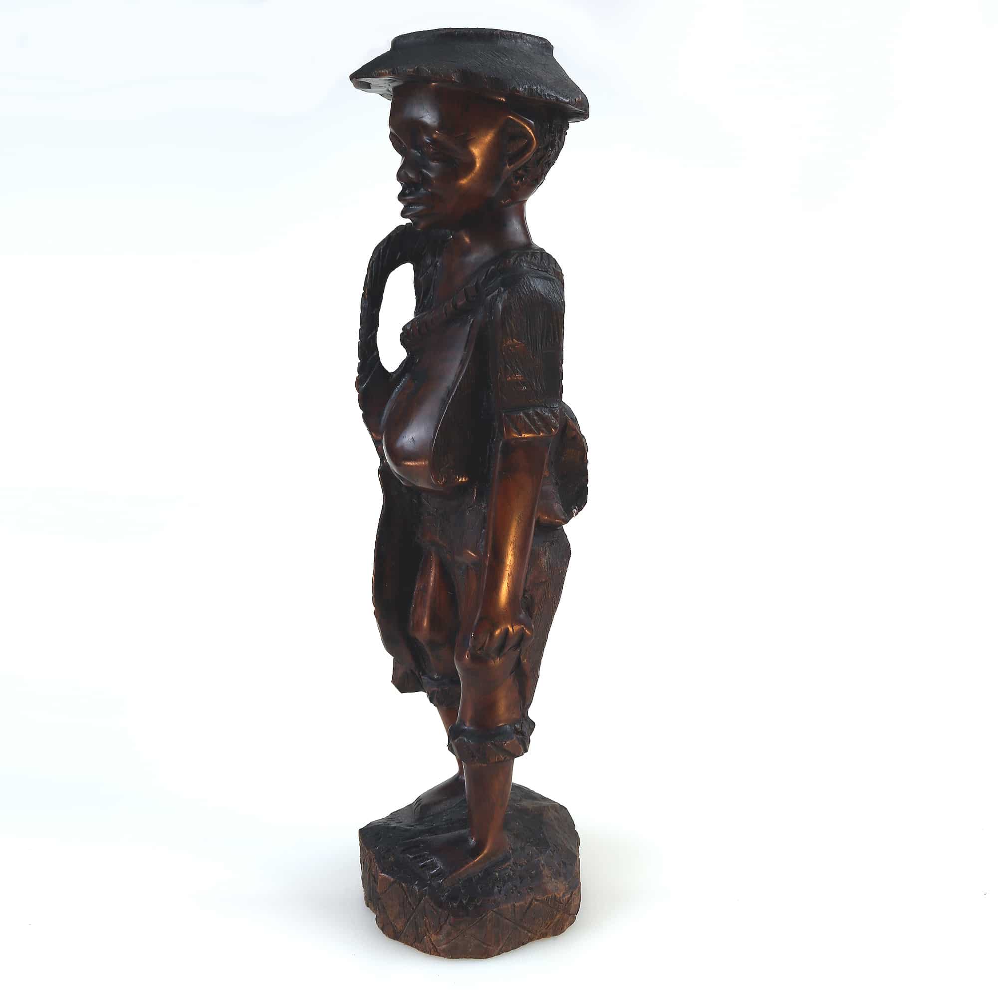 A large vintage hand-carved wood African Figure of a fisherman C.early/mid 20thC