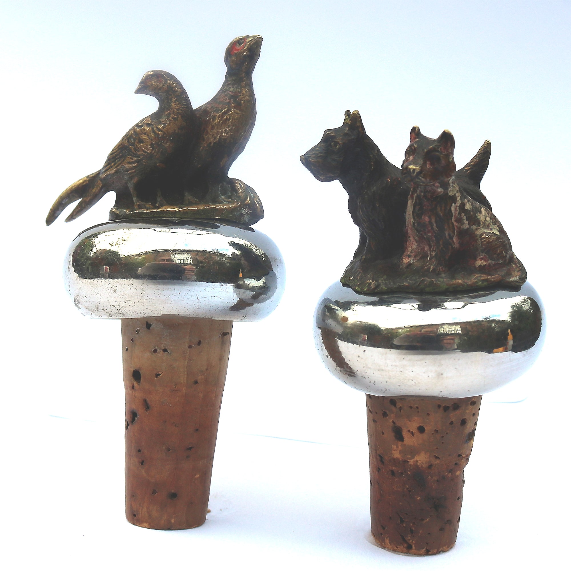 An extremely rare pair cold painted bronze novelty animal Bottle Stoppers C.1900