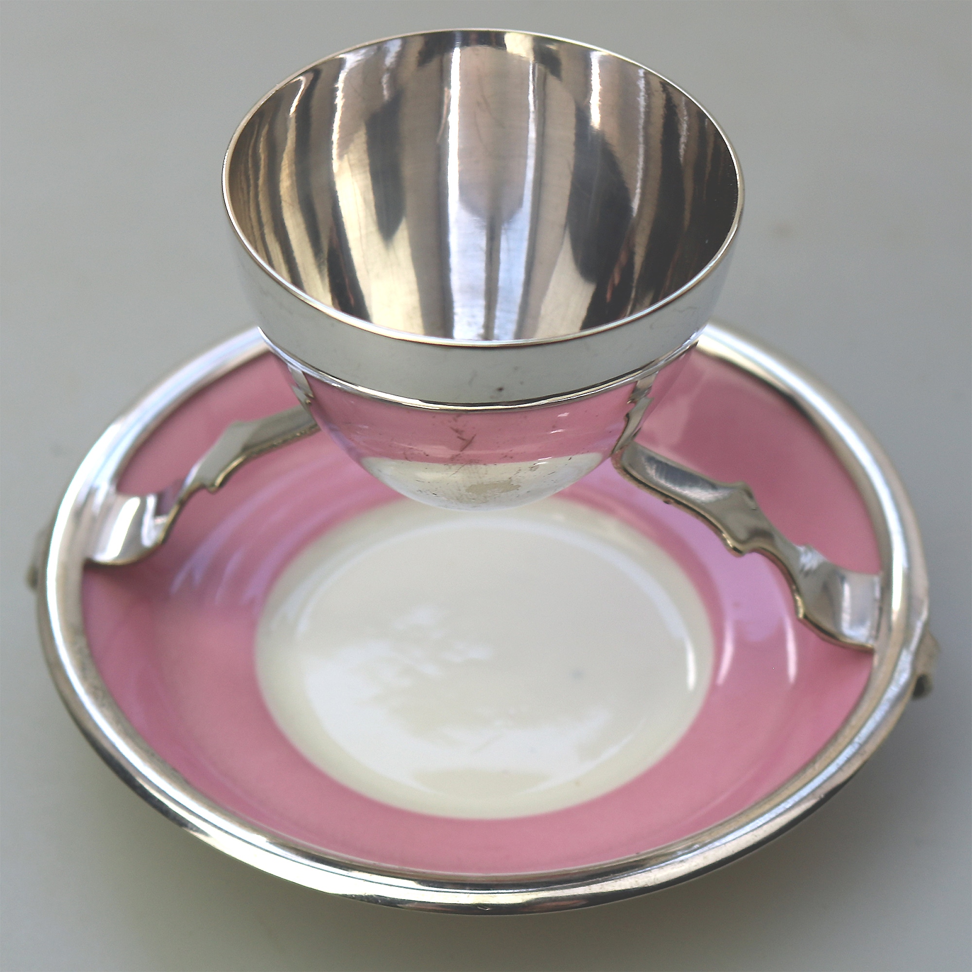 A Christopher Dresser antique novelty Egg Cup & Saucer by Hukin & Heath C.1900's