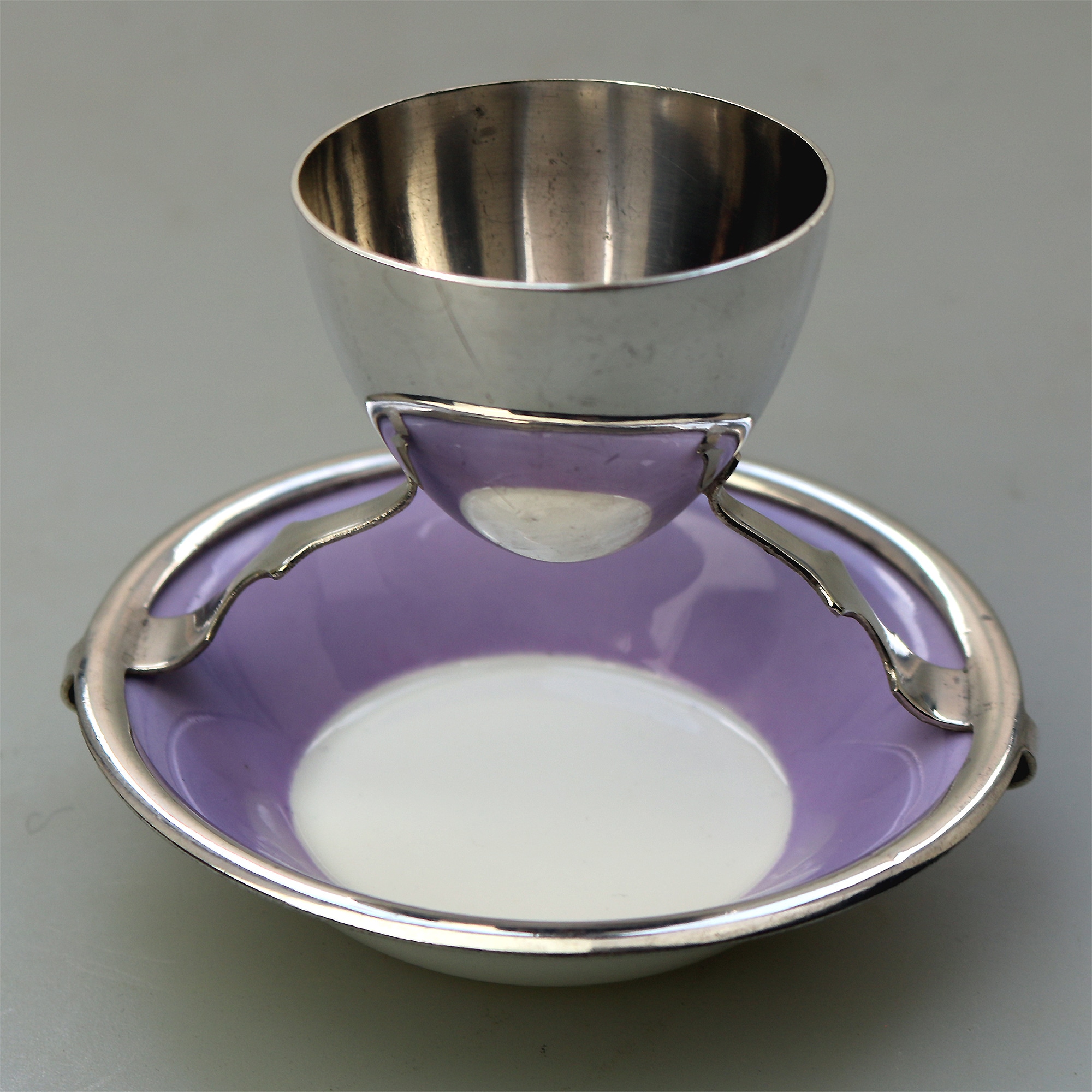 A Christopher Dresser antique novelty Egg Cup & Saucer by Hukin & Heath C.1900's