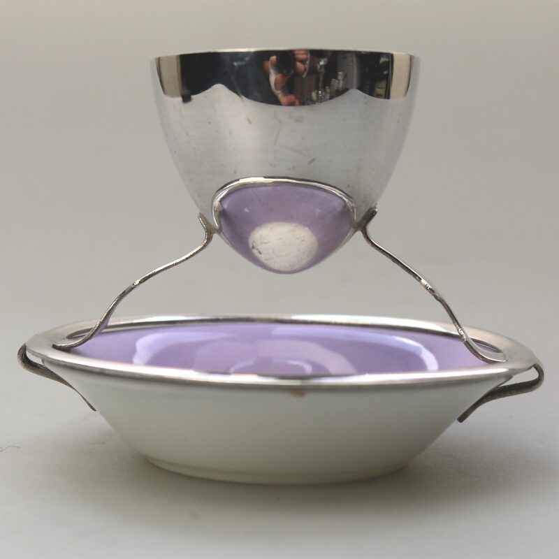A Christopher Dresser antique novelty Egg Cup & Saucer by Hukin & Heath C.1900's