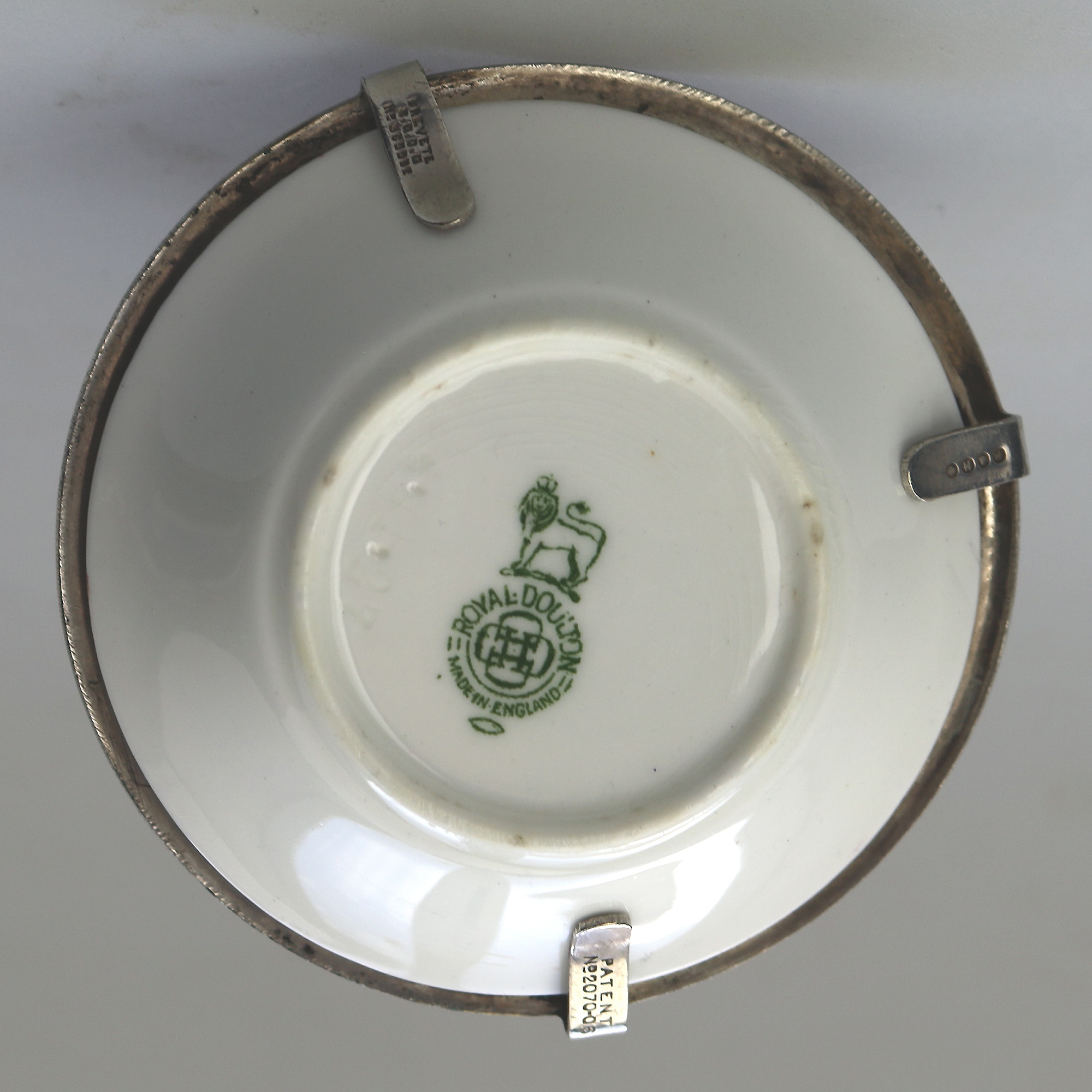 A Christopher Dresser antique novelty Egg Cup & Saucer by Hukin & Heath C.1900's