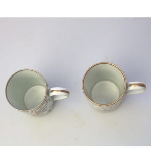 An unusual pair antique Samson of Paris porcelain hand painted Tankards C.19thC