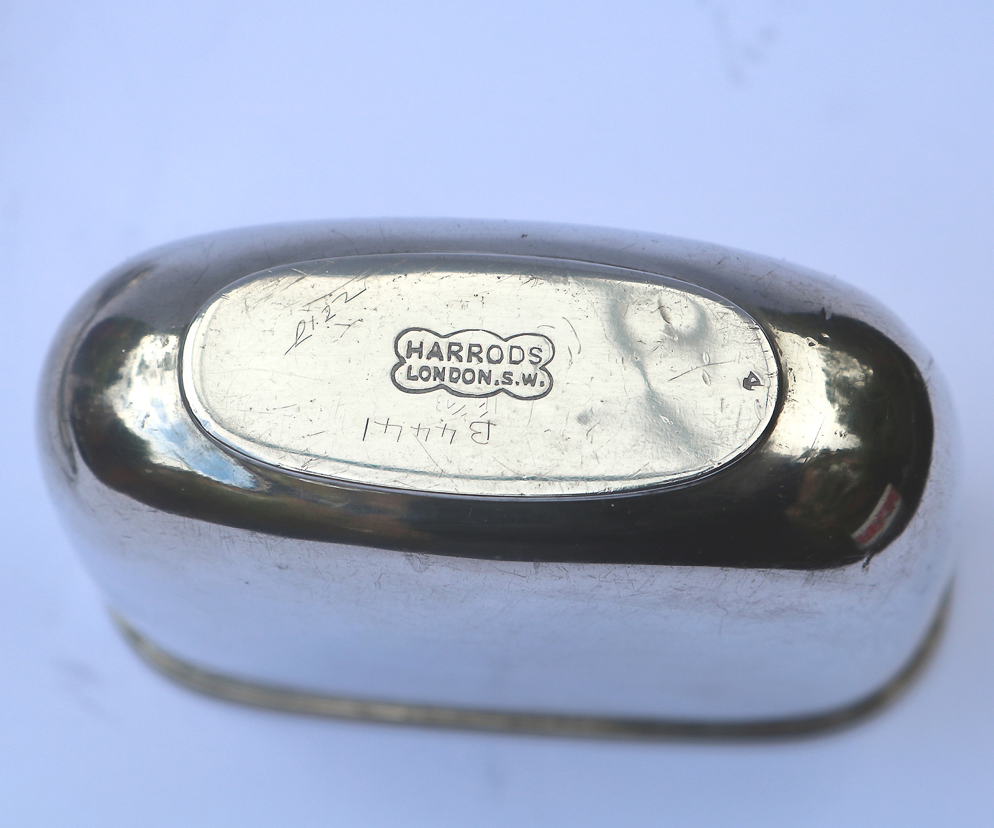 A good and attractive silver plated and glass Hip Flask by Harrods C.20thC