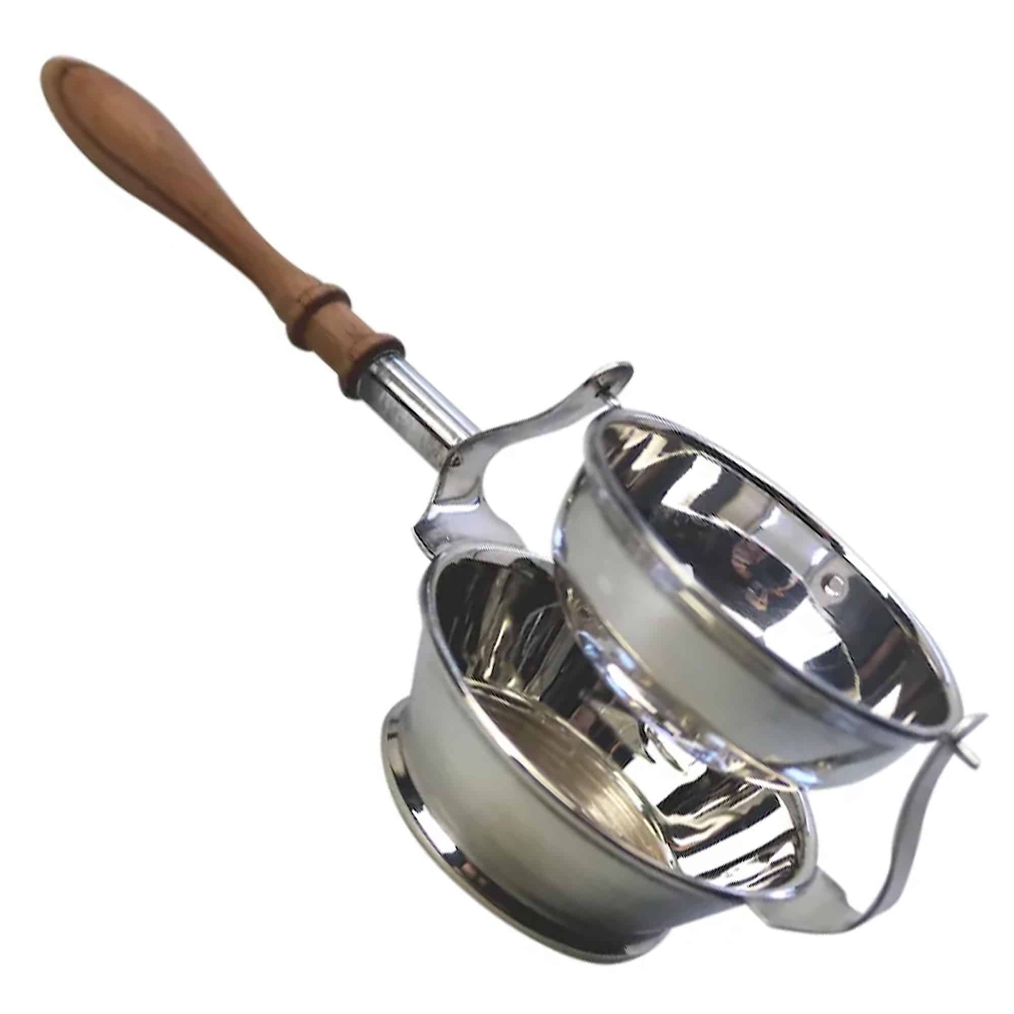 An unusual English solid silver novelty swinging Tea Strainer on stand 66g C.1993