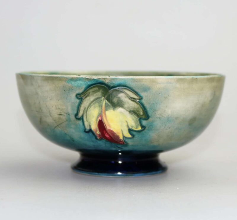 A good William Moorcroft antique British Art Pottery leaf & berry Bowl C.1928