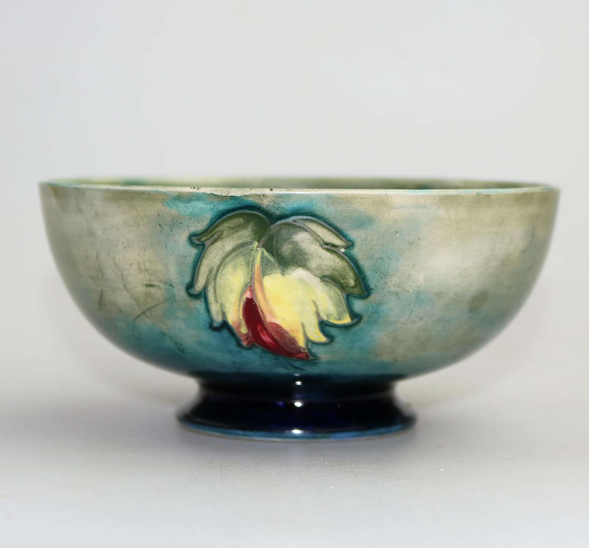 A good William Moorcroft antique British Art Pottery leaf & berry Bowl C.1928