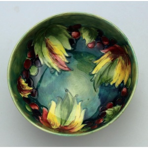 A good William Moorcroft antique British Art Pottery leaf & berry Bowl C.1928