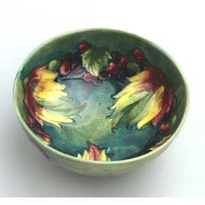 A good William Moorcroft antique British Art Pottery leaf & berry Bowl C.1928