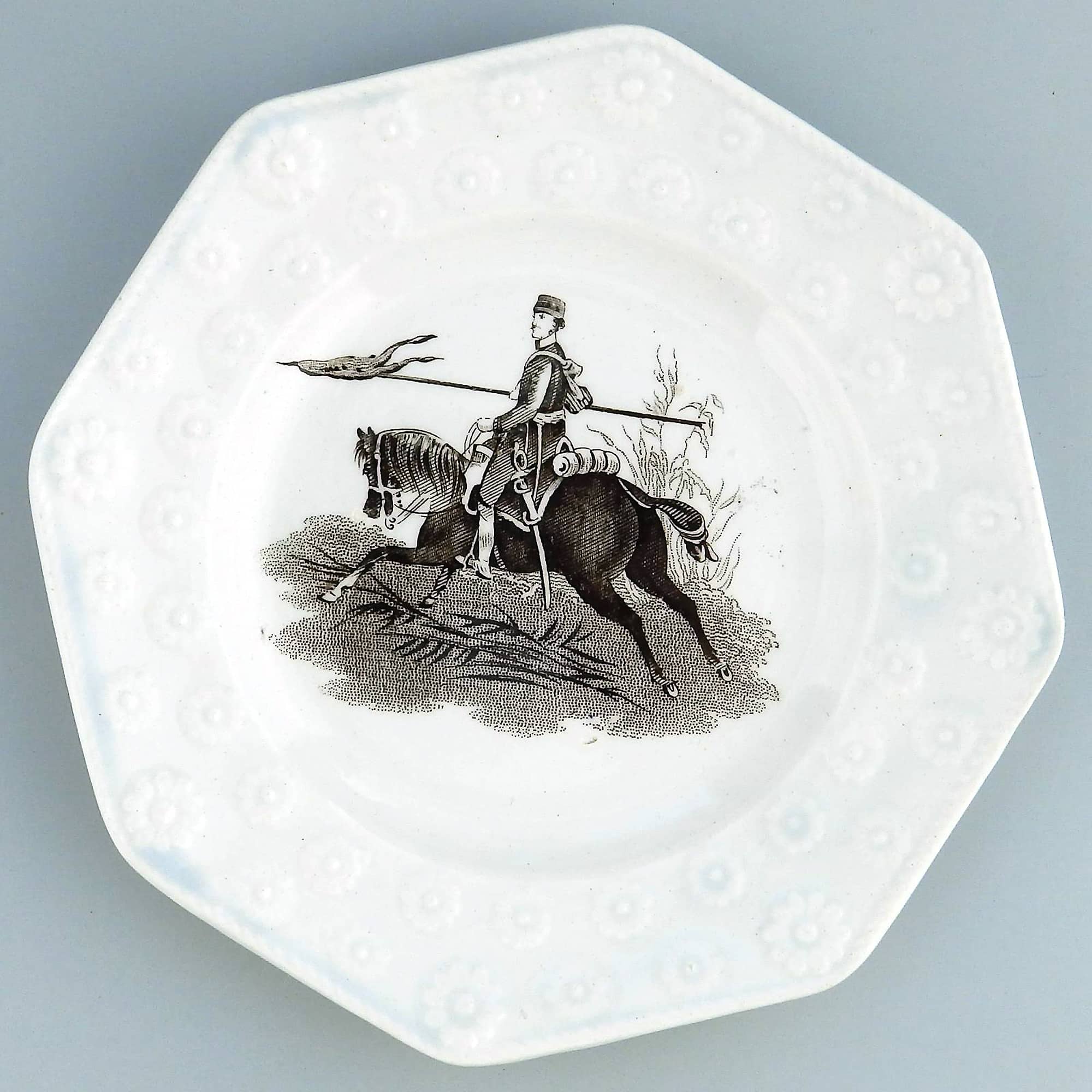 Unusual antique Staffordshire pottery daisy border Military Nursery Plate C.19th