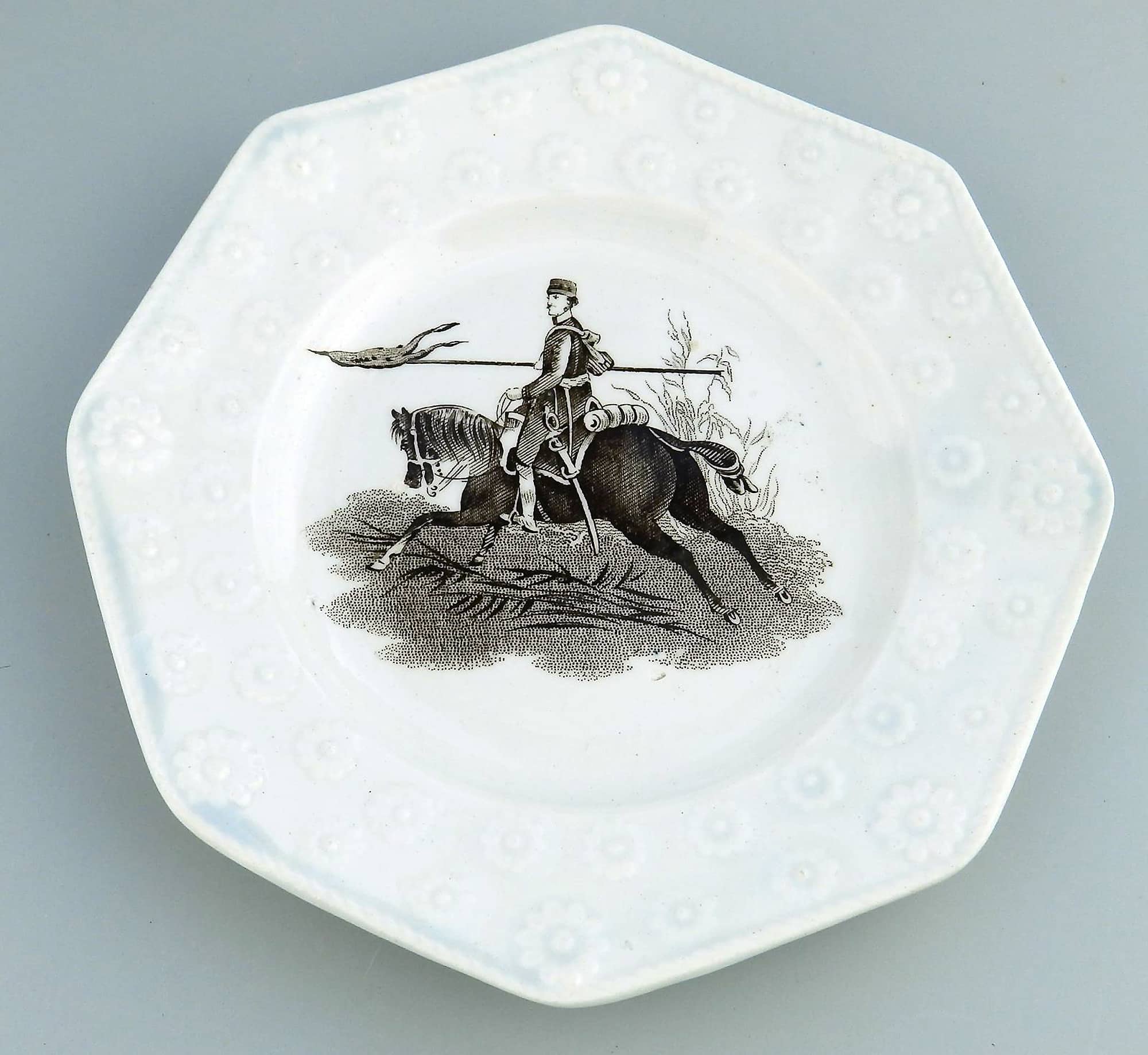 Unusual antique Staffordshire pottery daisy border Military Nursery Plate C.19th